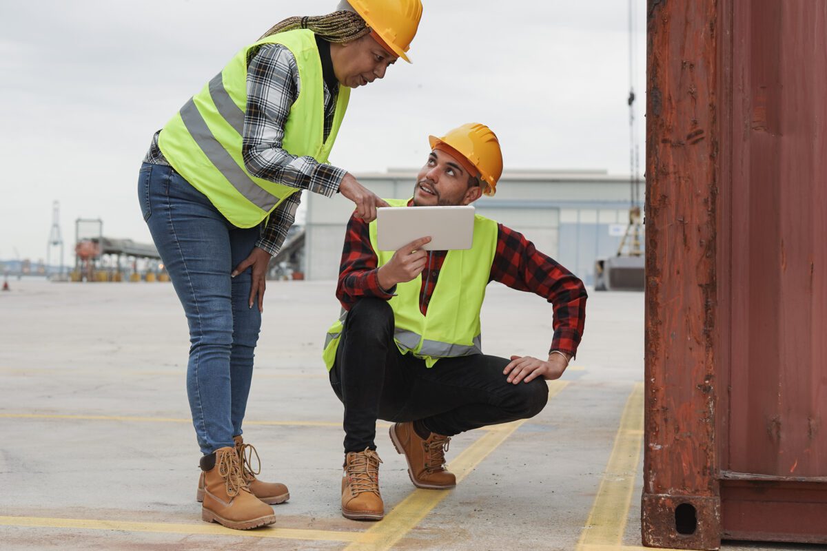 multiracial working people taking stock of the shi 2022 04 23 12 16 41 utc 1200x800 - GPS Tracker Container - Container GPS Tracking System